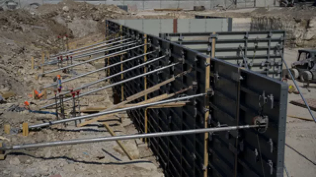 Forming and shoring erected material