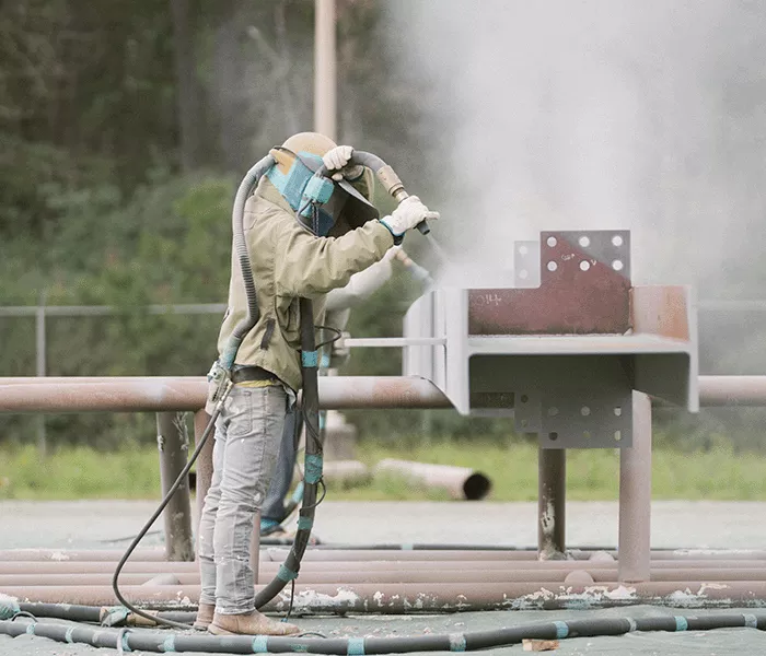 Industrial blaster at work NLH yard